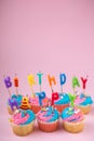 Happy birthday cupcakes with candles Royalty Free Stock Photo