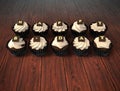 Happy Birthday cupcakes on dark wooden background Royalty Free Stock Photo