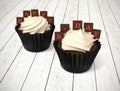 Happy Birthday cupcakes with on white wood with red chocolate le Royalty Free Stock Photo