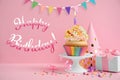 Happy Birthday! Delicious cupcake with candles on pink background