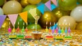 Happy birthday greeting card to a 7 year old child, birthday cupcake with candles and birthday decorations on the background Royalty Free Stock Photo