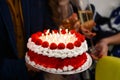 Happy birthday. A group people holding cake. Royalty Free Stock Photo