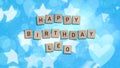 Happy Birthday Leo card with wooden tiles text