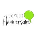 Happy Birthday lettering in French (Joyeux Anniversaire) with green balloon Royalty Free Stock Photo