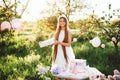 Happy birthday little girl with pink decor in beautiful garden. Royalty Free Stock Photo