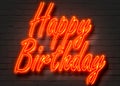 Happy birthday, neon sign on brick wall Royalty Free Stock Photo