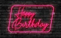 Happy Birthday Neon Sign on a dark wall Royalty Free Stock Photo
