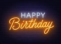 Happy birthday neon sign. Greeting card on dark background. Royalty Free Stock Photo