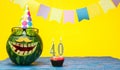 Happy birthday with number 40. Funny watermelon in festive garlands for happy birthday greetings funny. Copy space