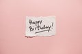 Happy birthday, paper with text on pink background