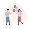 Happy birthday party concept. Young woman gives a man balloons Royalty Free Stock Photo