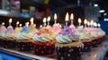 Happy Birthday! Pastel cupcakes with candles. Birth day celebrations. Generative AI