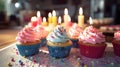 Happy Birthday! Pastel cupcakes with candles. Birth day celebrations. Generative AI