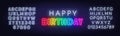 Happy birthday rainbow neon sign on a brick wall.