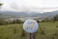 Happy Birthday stone with Turano lake background, Italy