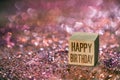 Happy birthday text with heart bokeh light