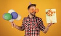 happy birthday to you. male holiday celebration. bearded guy with party balloons and gift box. unshaven handsome man Royalty Free Stock Photo