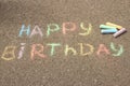 Happy birthday written in colored crayons on the sidewalk Royalty Free Stock Photo