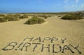 Happy birthday written with stones Royalty Free Stock Photo