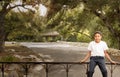 Happy Black African American boy sitting on iron gate Royalty Free Stock Photo