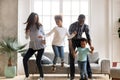 Happy black African family dancing at home Royalty Free Stock Photo