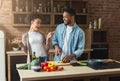 Happy black couple cooking dinner together Royalty Free Stock Photo