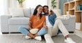 Happy black couple, eating popcorn and a movie playing in the living room of their home or house. Love, romance and man Royalty Free Stock Photo