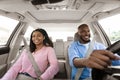 Happy black couple enjoying drive on new car Royalty Free Stock Photo