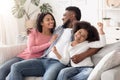 Happy Black Couple Enjoying Time At Home, Hugging And Having Fun Together Royalty Free Stock Photo