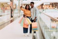 Happy black couple taking selfie at shopping mall Royalty Free Stock Photo