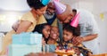 Happy black family, birthday and bonding in celebration for party, holiday or special day together at home. Excited Royalty Free Stock Photo