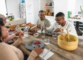 Happy black family enjoying while having healthy lunch together at home Royalty Free Stock Photo