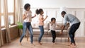 Happy black family have fun dancing at home Royalty Free Stock Photo