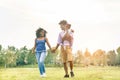 Happy black family having fun doing picnic outdoor - Parents and their daughter enjoying time together in a weekend day - Love Royalty Free Stock Photo