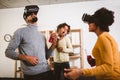 Black family at home. Dad, mom and daughter playing virtual reality