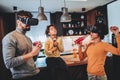 Black family at home. Dad, mom and daughter playing virtual reality