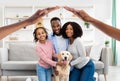 Happy black family posing with dog at home Royalty Free Stock Photo