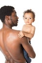 Happy black father and child boy cuddling on isolated white background. Royalty Free Stock Photo