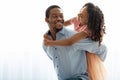 Happy black father and daughter bonding over white background Royalty Free Stock Photo