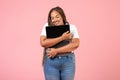 Happy Black Freelancer Woman Hugging Laptop Computer Over Pink Background Royalty Free Stock Photo