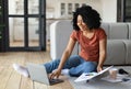 Happy Black Freelancer Woman Working With Laptop And Papers At Home Royalty Free Stock Photo
