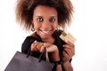 Happy black girl with shopping bags, credit card Royalty Free Stock Photo