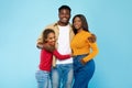 Happy black guy posing with wife and smiling teen daughter Royalty Free Stock Photo