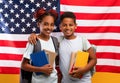 Happy black kids posing over american flag Royalty Free Stock Photo