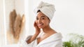 Happy Black Lady Touching Face With Smooth Skin In Bathroom Royalty Free Stock Photo