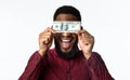 Happy Black Man Holding One Hundred Dollar Banknote, White Background