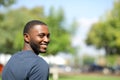 Happy black man looking at camera in a park Royalty Free Stock Photo