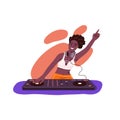 Happy black-skinned DJ woman playing recorded music with electronic audio controller. Person mixing sounds at console