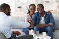 Happy Black Spouses Thankful To Family Counselor After Successful Marital Therapy Royalty Free Stock Photo
