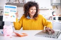 Happy black woman checking her good credit score online Royalty Free Stock Photo